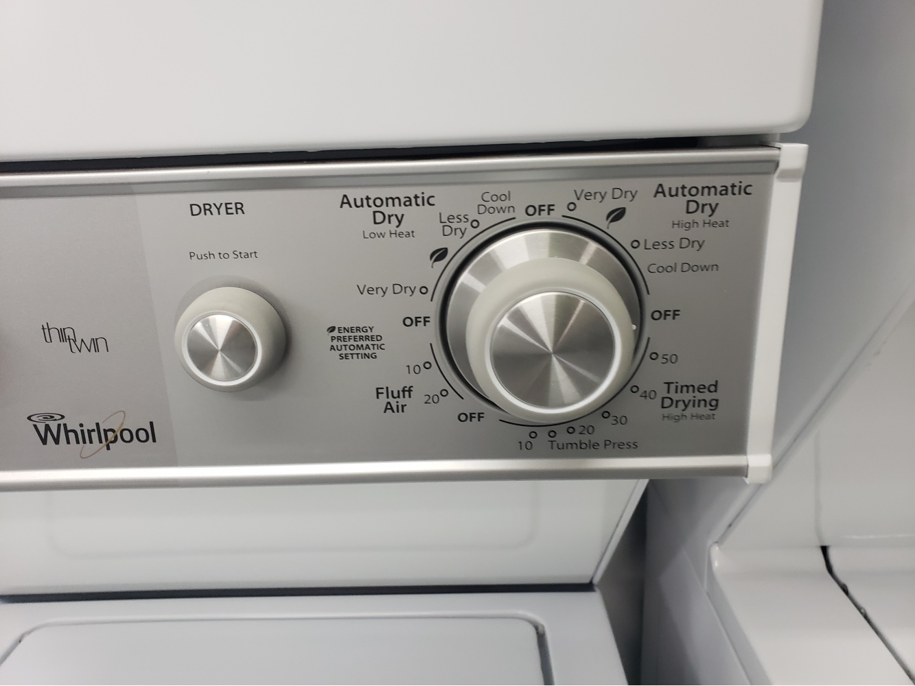 WHIRLPOOL THIN TWIN 24'' LAUNDRY CENTER TOP LOADING WITH ELECTRIC DRYER