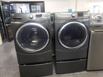 GE DARK GREY FRONT LOAD  STEAM WASHER AND GAS DRYER SET W/ PEDESTALS ***OUT OF STOCK***