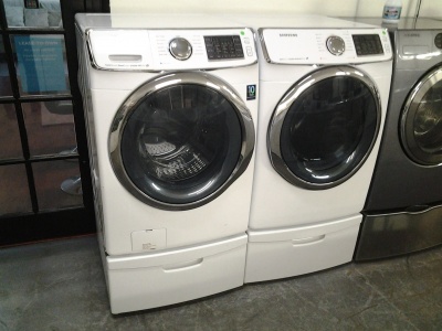 SAMSUNG WHITE 27" HE WASHER & GAS DRYER ON PEDISTALS W/STEAM   ***OUT OF STOCK***