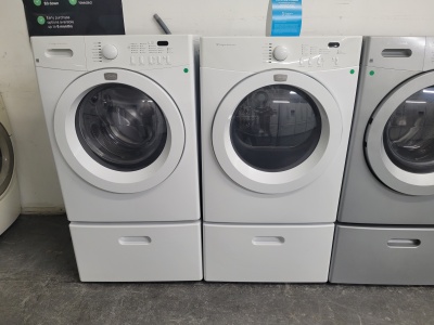 FRIGIDAIRE WHITE FRONT LOAD WASHER AND GAS DRYER SET WITH PEDESTALS 