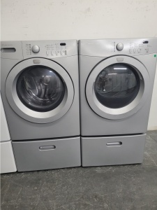 FRIGIDIARE GREY FRONT LOAD WASHER AND GAS DRYER SET WITH PEDESTALS 