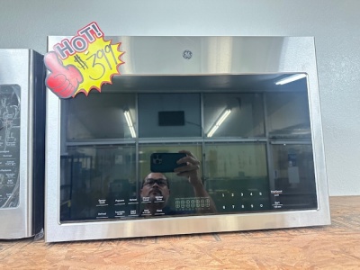 New-GE 24" 1.4 Cu. Ft. Over-The-Range Microwave Oven  Model #: GVMB14S4WSS