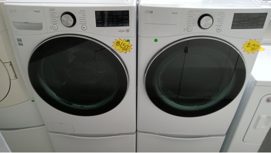 Pre-Owned LG 4.5 Cu. Ft. SMART Front Load Washer & Pre-Owned LG 7.4 Cu. Ft. Vented Gas Dryer